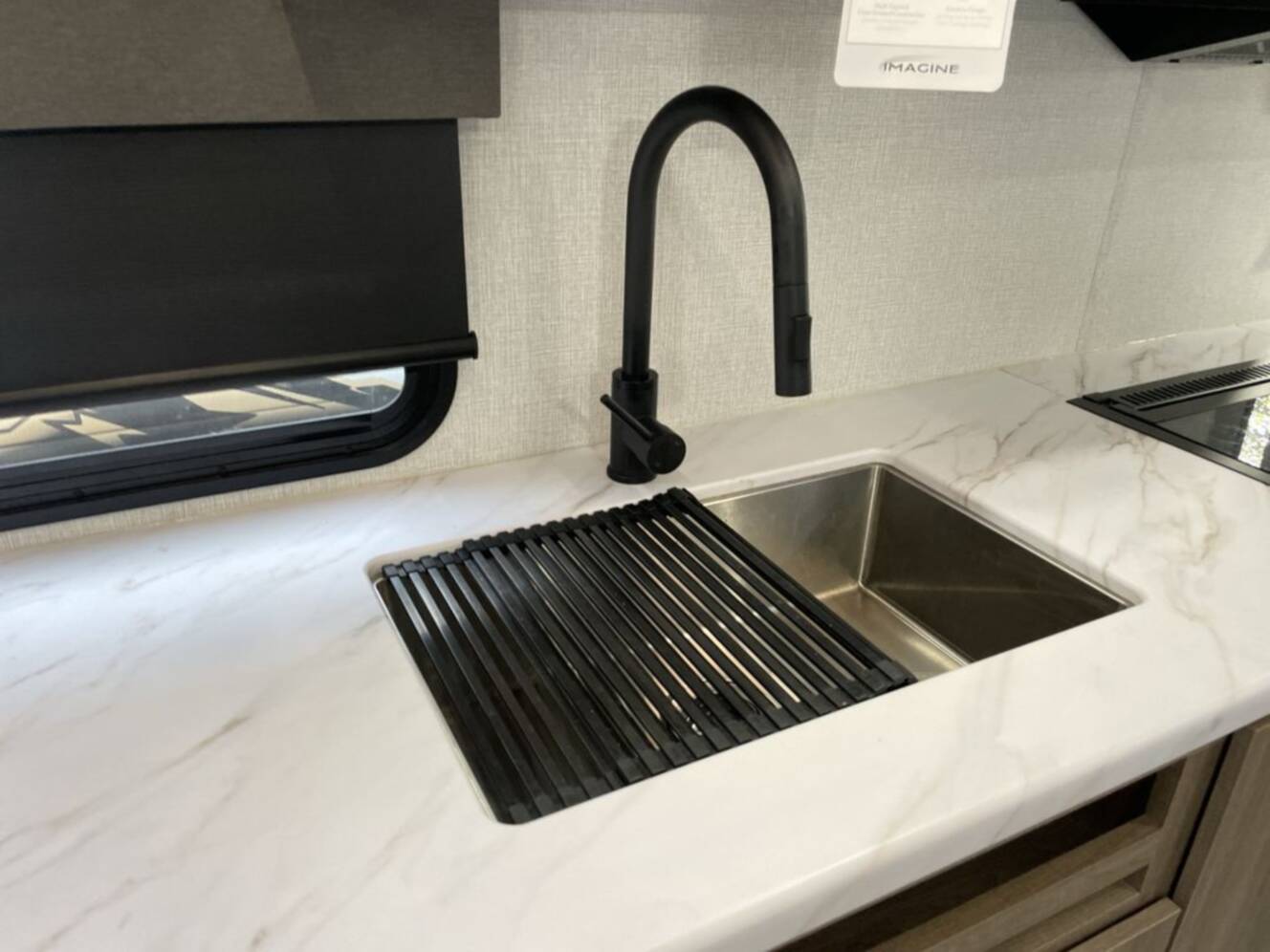 A photo of this 2024 Grand Design Imagine XLS 17MKE