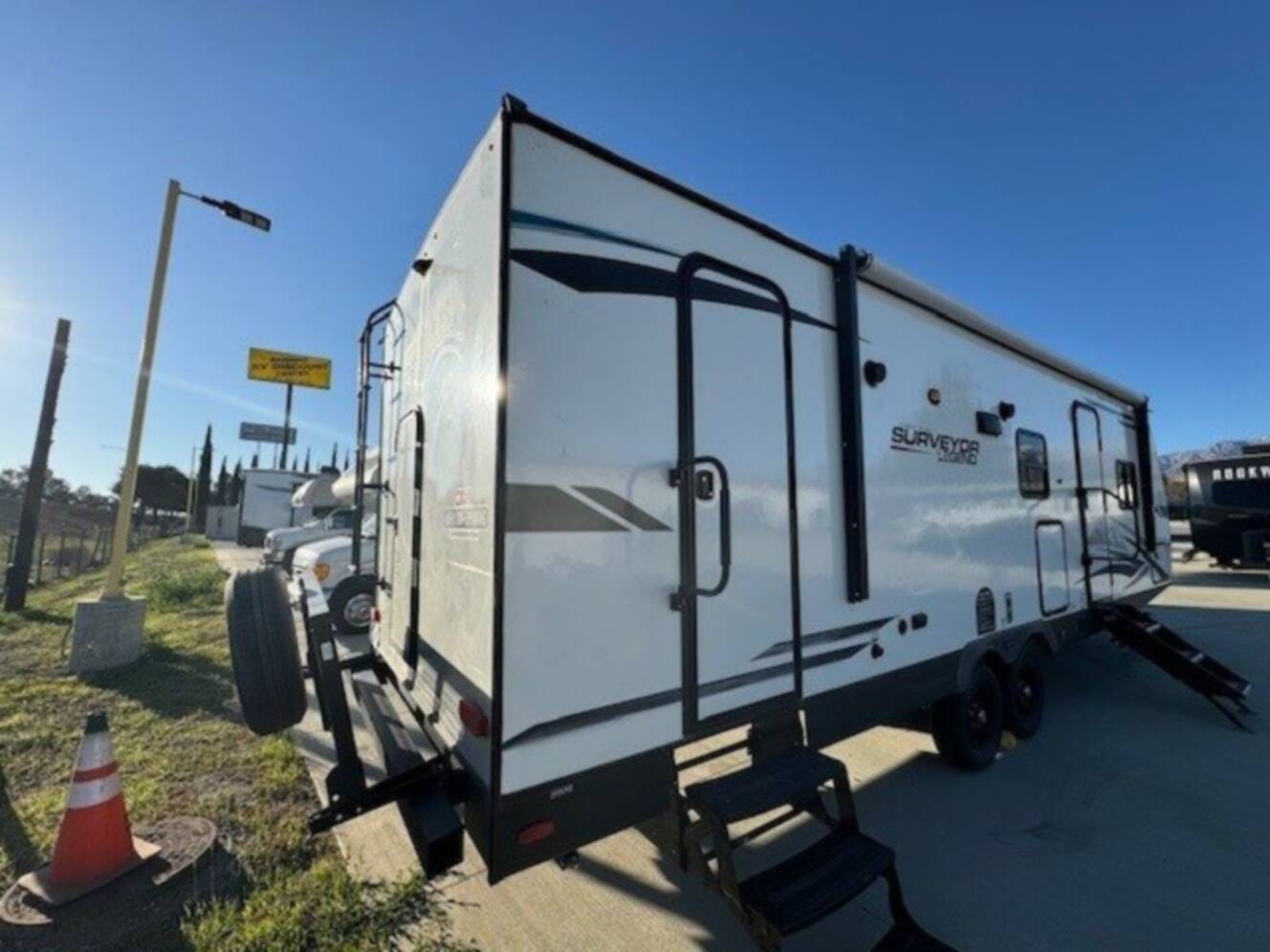 A photo of this 2022 Forest River SURVEYOR LEGEND 276BHLE