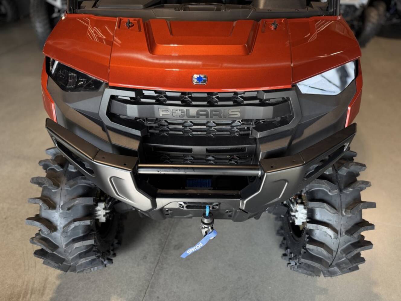 A photo of this 2026 Polaris RGR CREW XP 1000 PREMIUM ORANGE RUST