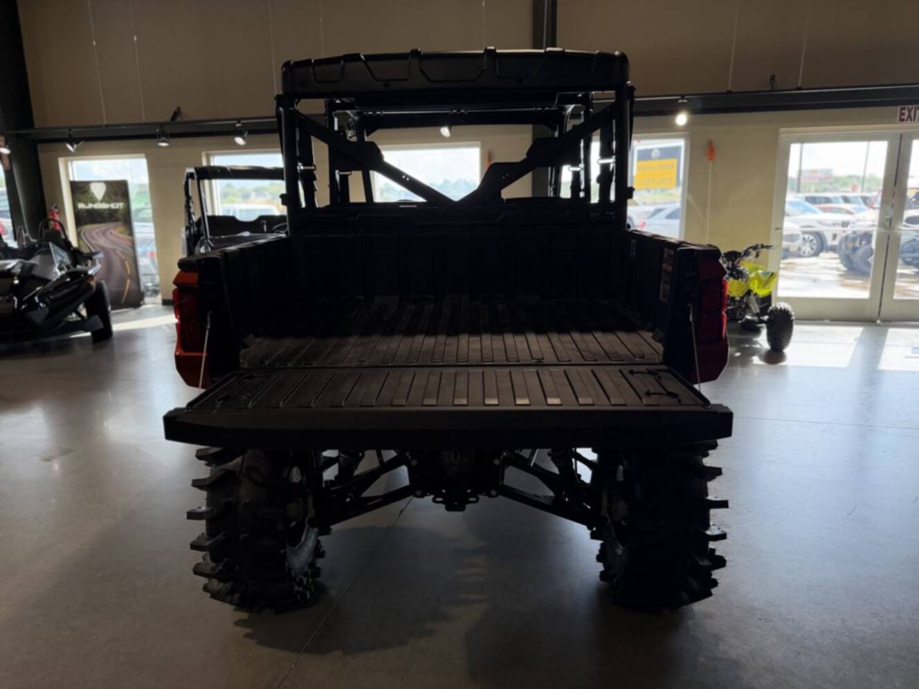A photo of this 2026 Polaris RGR CREW XP 1000 PREMIUM ORANGE RUST