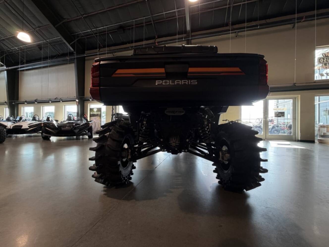 A photo of this 2026 Polaris RGR CREW XP 1000 PREMIUM ORANGE RUST