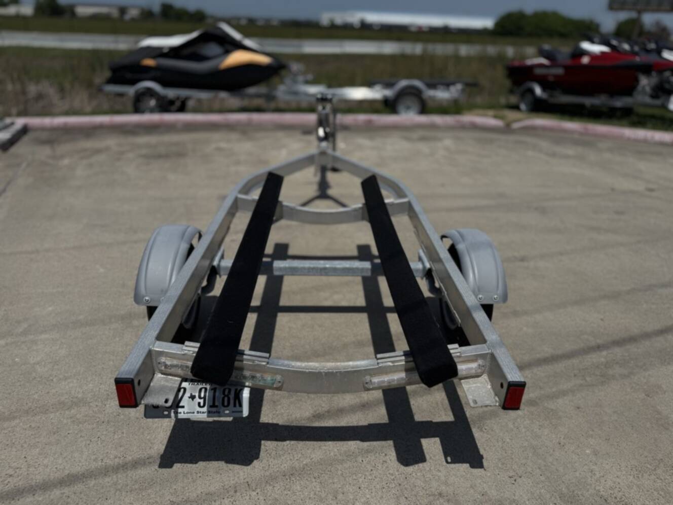 A photo of this 2021 Karavan Trailers, Inc. TRAILER SEADOO MOVE I XL1250 A 21