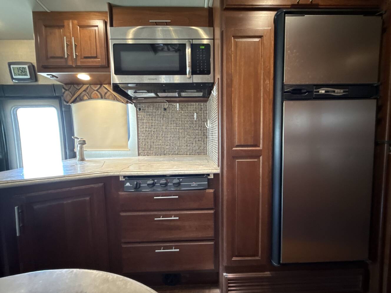 A photo of this 2013 Dynamax DX3 37BHHD