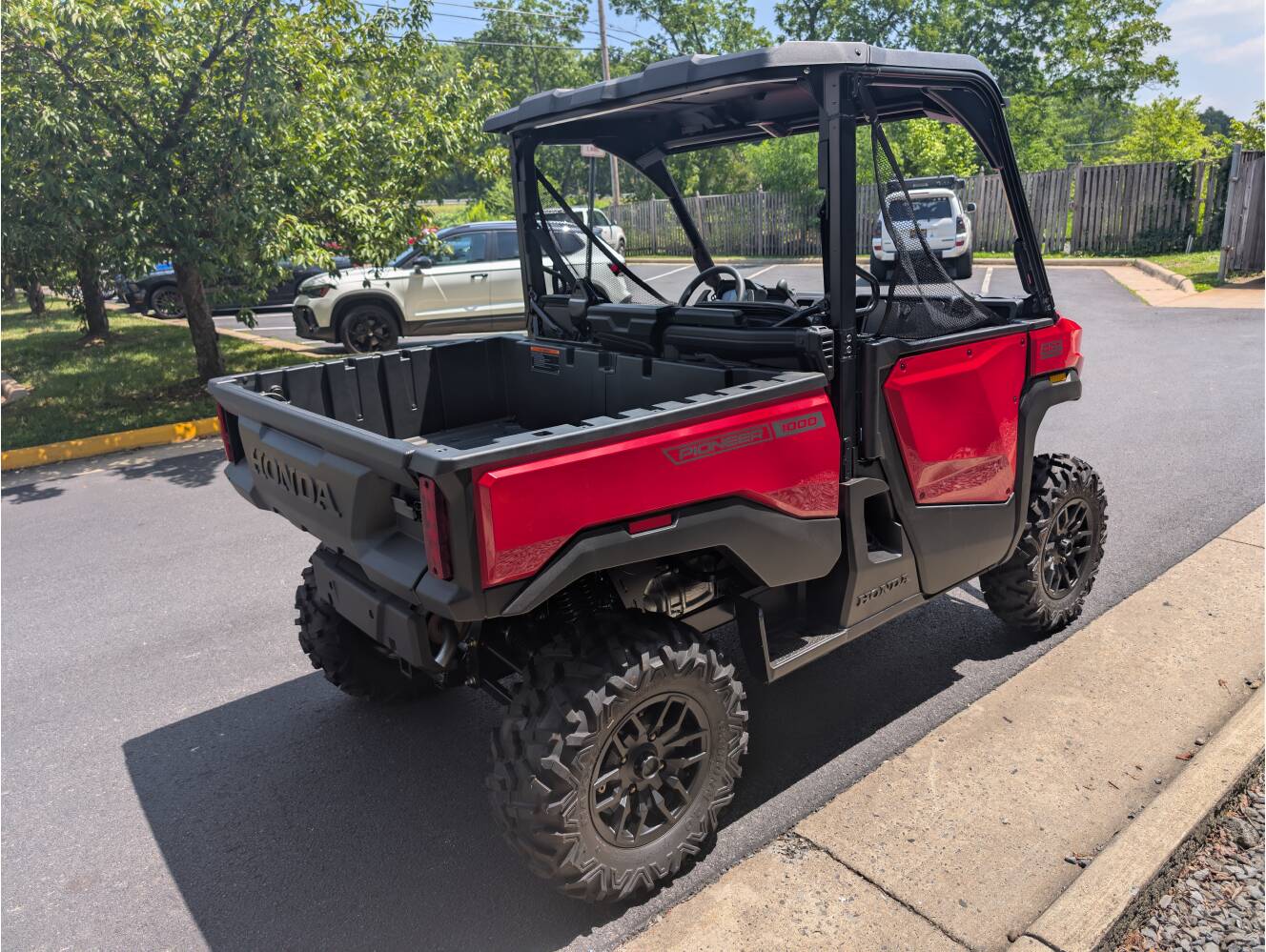 A photo of this 2026 Honda Pioneer 1000 Deluxe
