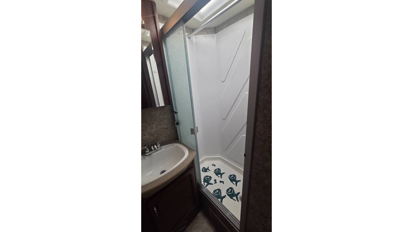 A photo of this 2014 Fleetwood Storm 28F