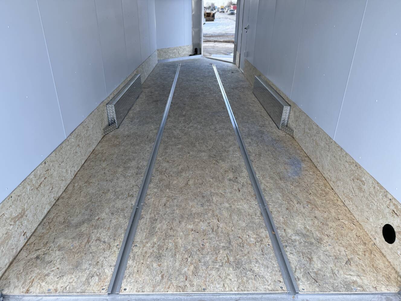 A photo of this 2026 Ez Hauler EZES 7.5X24 Enclosed Snowmobile Trailer