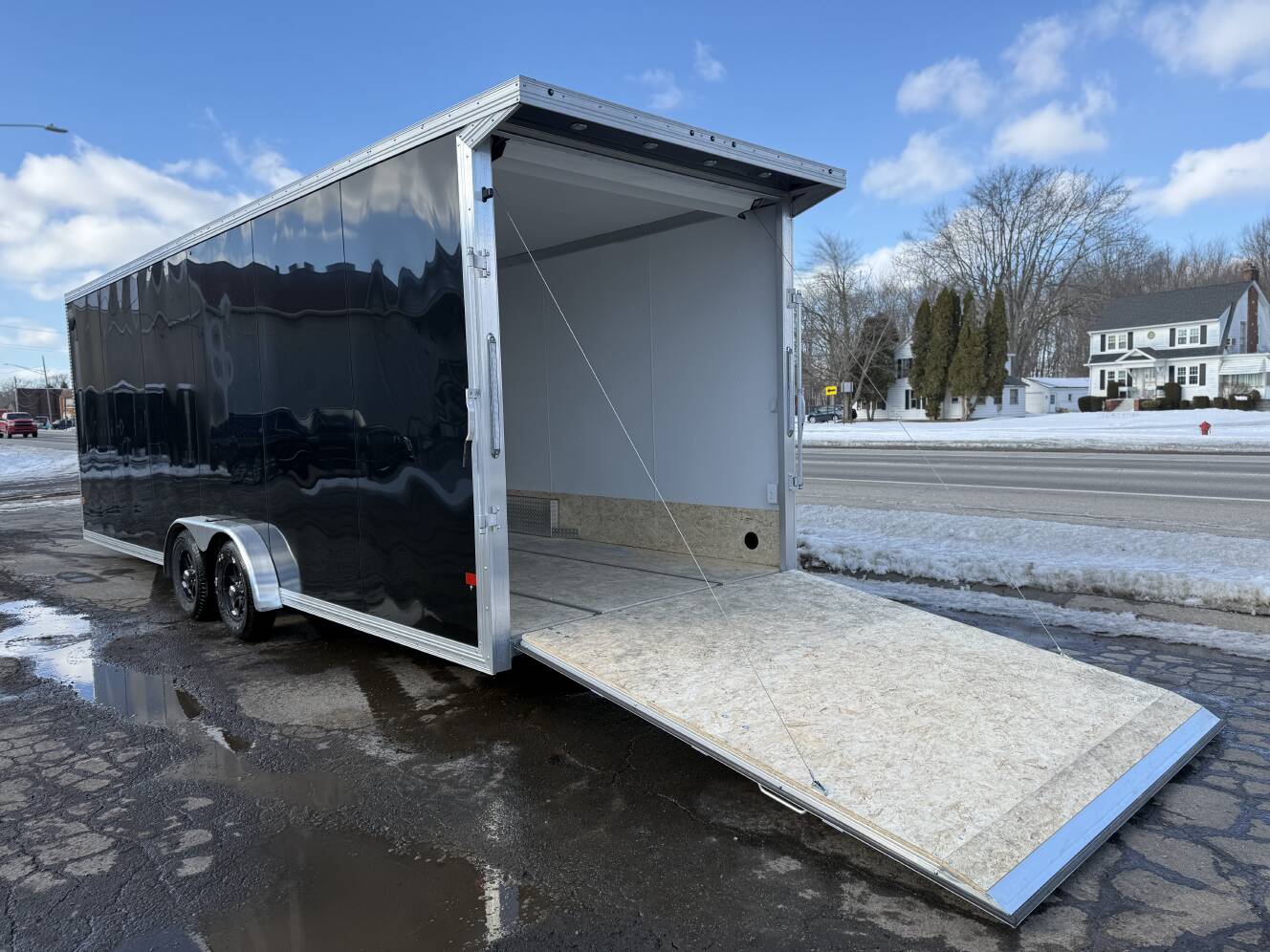 A photo of this 2026 Ez Hauler EZES 7.5X24 Enclosed Snowmobile Trailer
