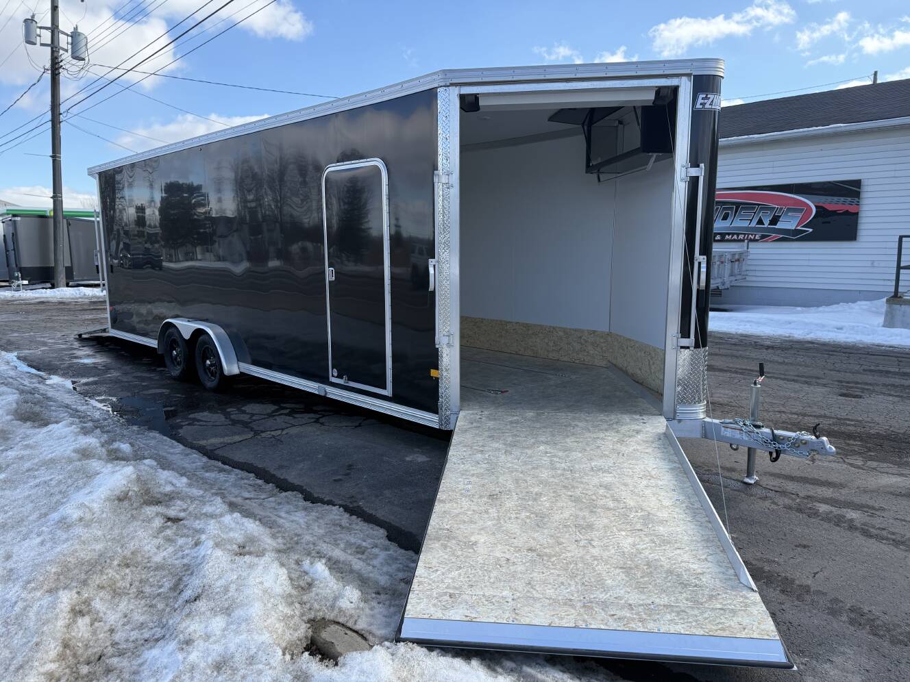 A photo of this 2026 Ez Hauler EZES 7.5X24 Enclosed Snowmobile Trailer