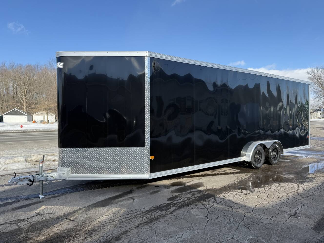 A photo of this 2026 Ez Hauler EZES 7.5X24 Enclosed Snowmobile Trailer