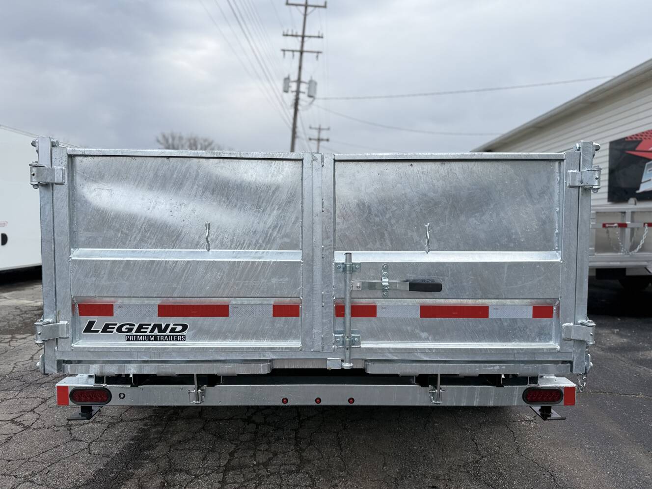 A photo of this 2026 Legend Trailers 7x14 Galvanized Tandem Axle Dump Trailer