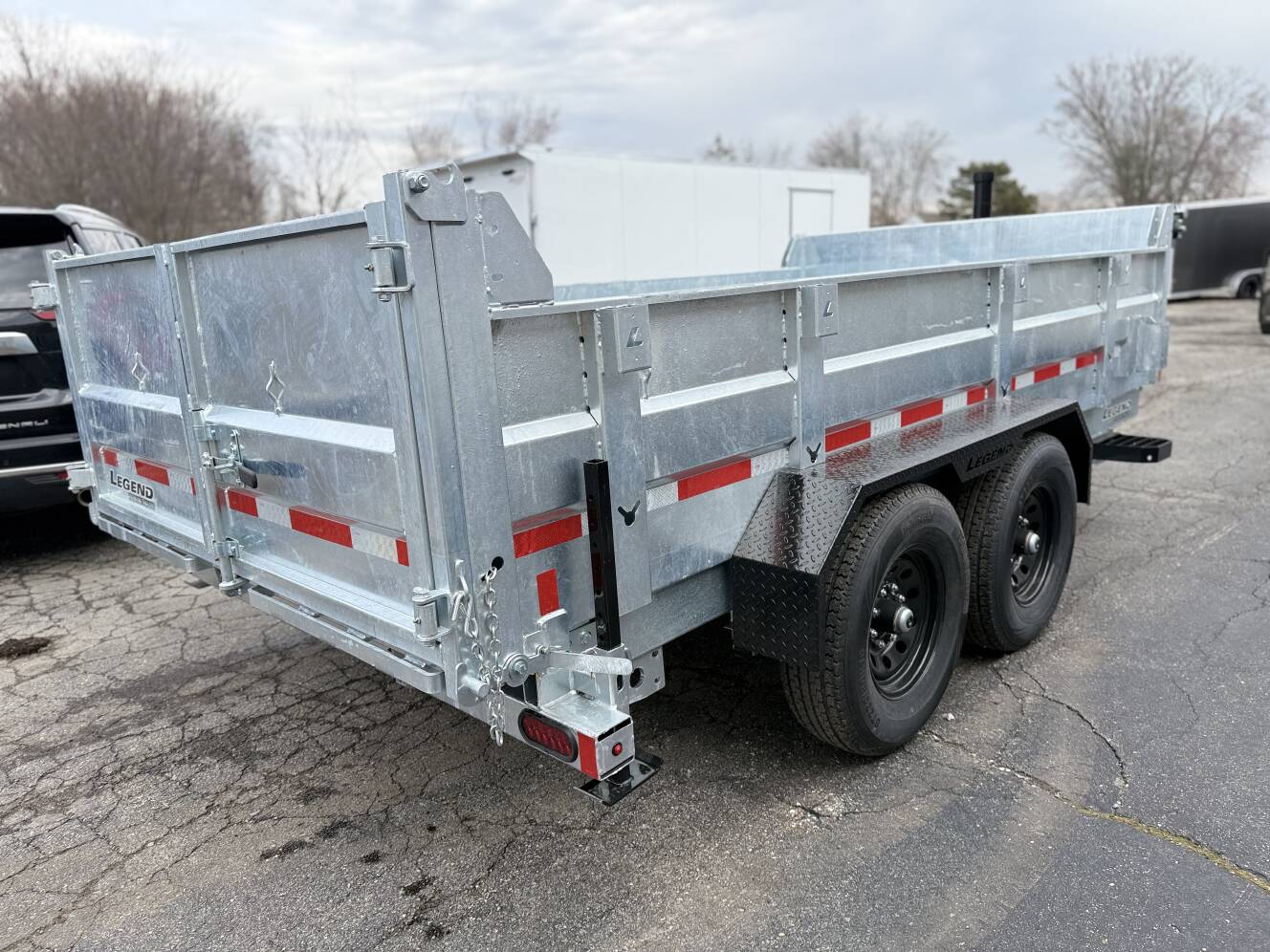 A photo of this 2026 Legend Trailers 7x14 Galvanized Tandem Axle Dump Trailer