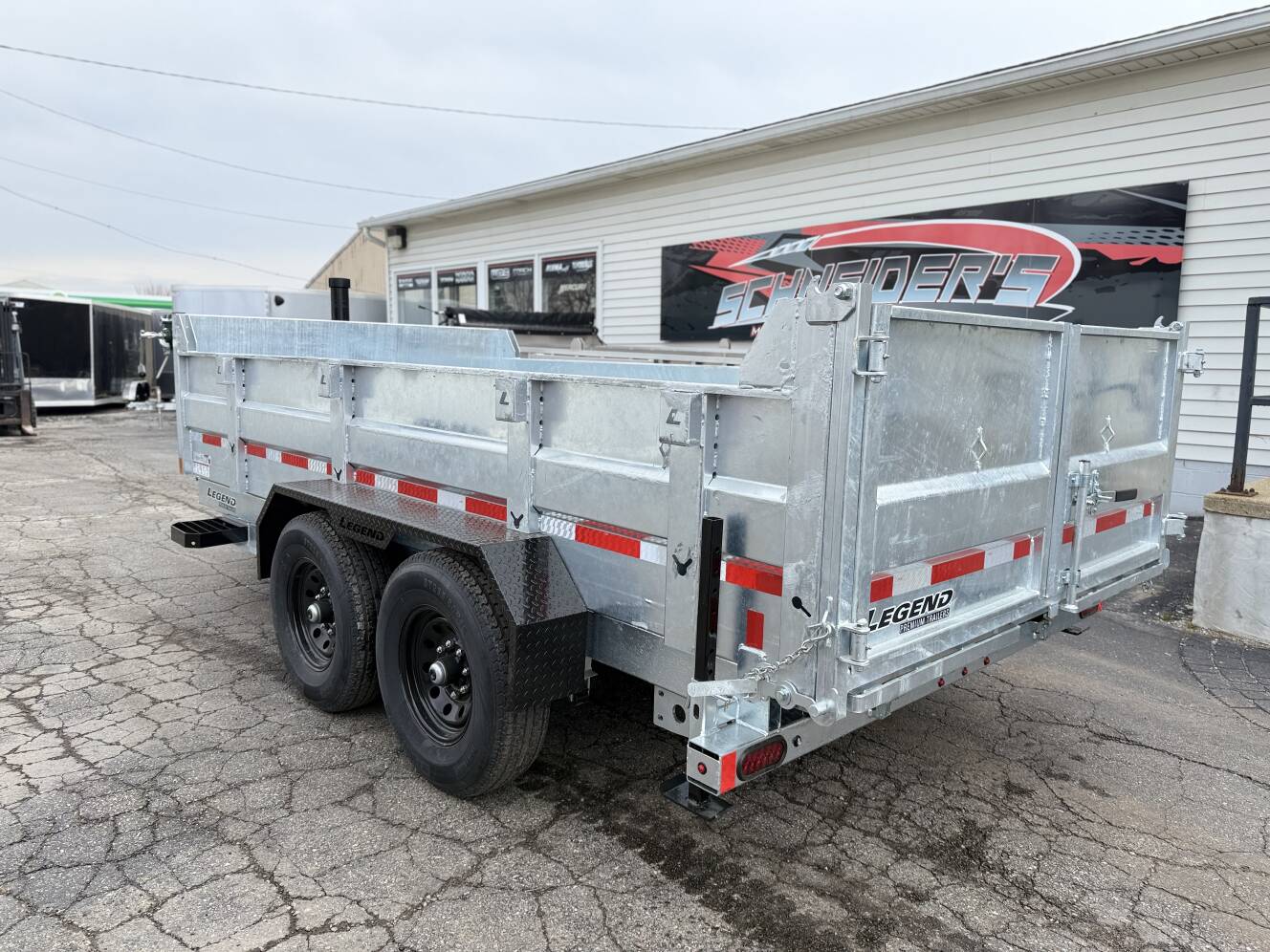 A photo of this 2026 Legend Trailers 7x14 Galvanized Tandem Axle Dump Trailer