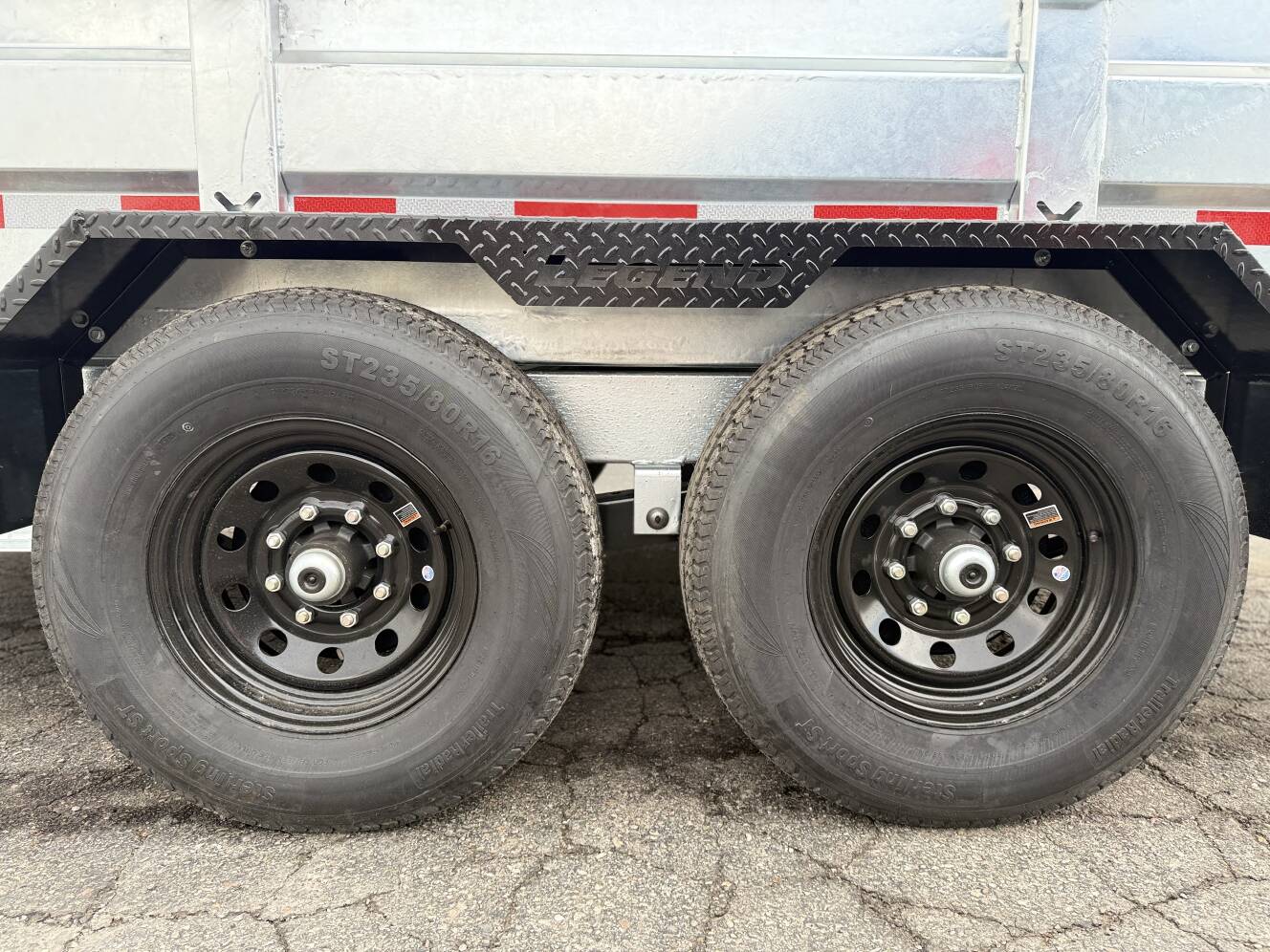 A photo of this 2026 Legend Trailers 7x14 Galvanized Tandem Axle Dump Trailer