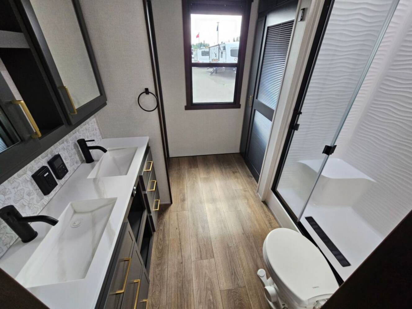 A photo of this 2027 Forest River Cedar Creek Cottage 40CFL2B