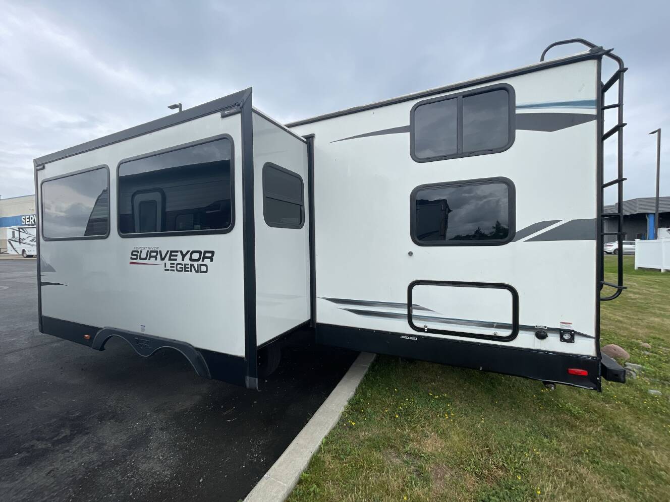 A photo of this 2022 Forest River SURVEYOR 276BHLE