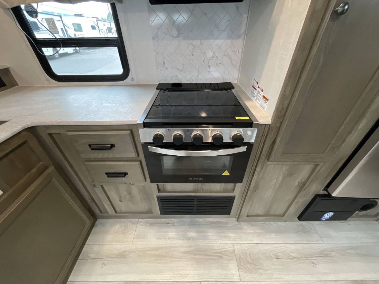 A photo of this 2022 Forest River SURVEYOR 276BHLE