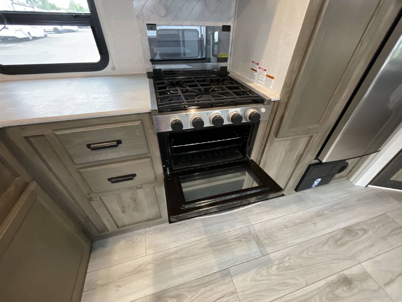 A photo of this 2022 Forest River SURVEYOR 276BHLE