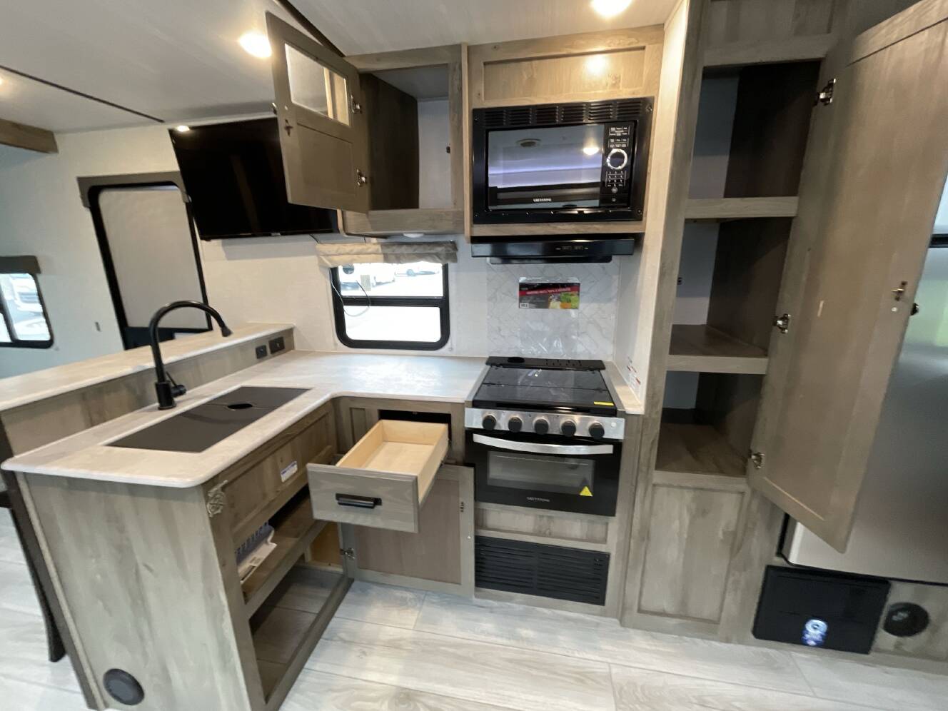 A photo of this 2022 Forest River SURVEYOR 276BHLE