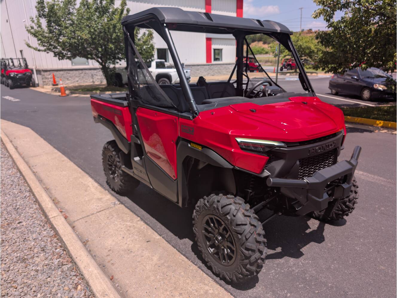 A photo of this 2026 Honda Pioneer 1000 Deluxe