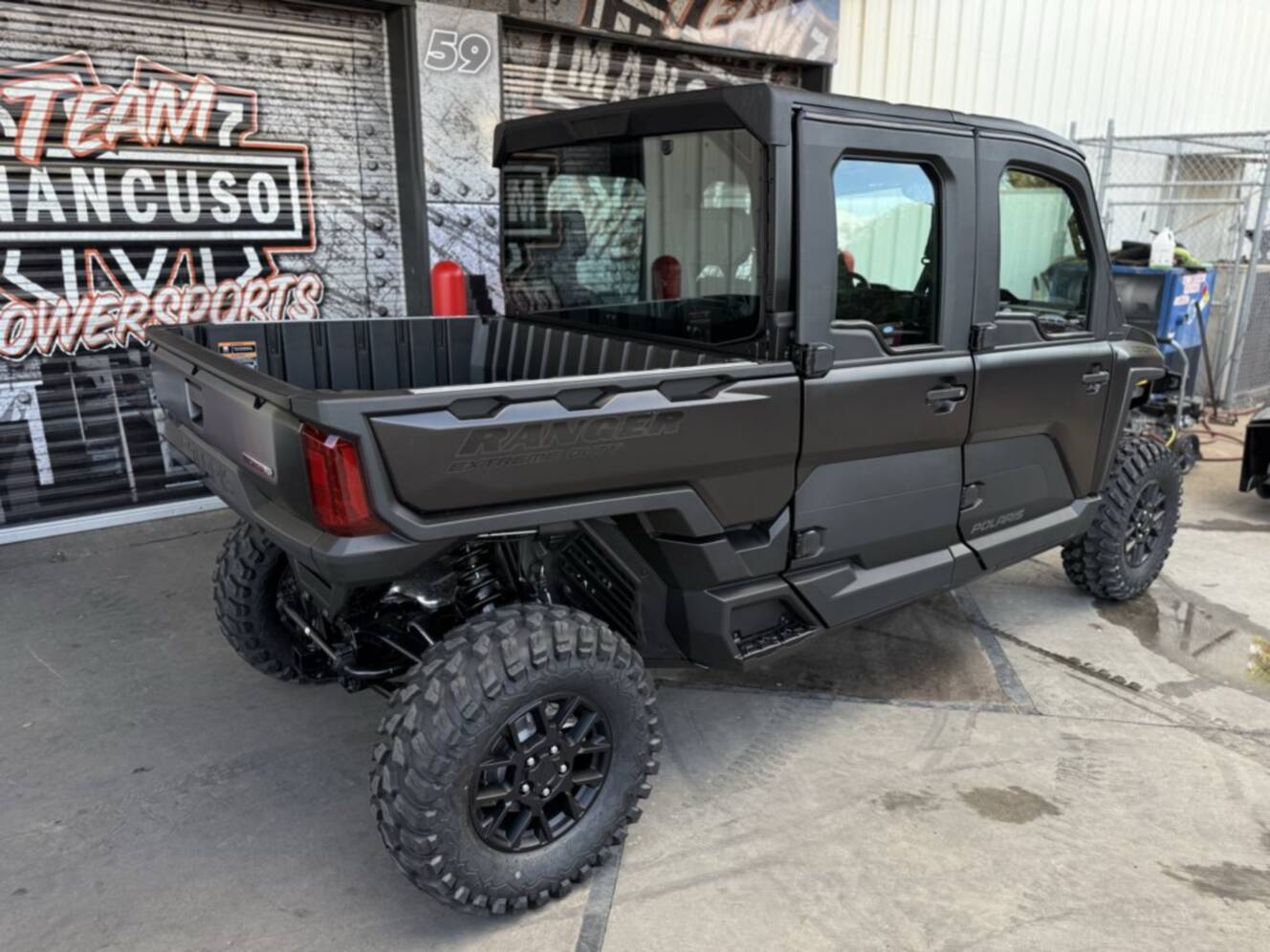 A photo of this 2026 Polaris RGR CREW XD 1500 NS PREMIUM SUPER GRAPHITE