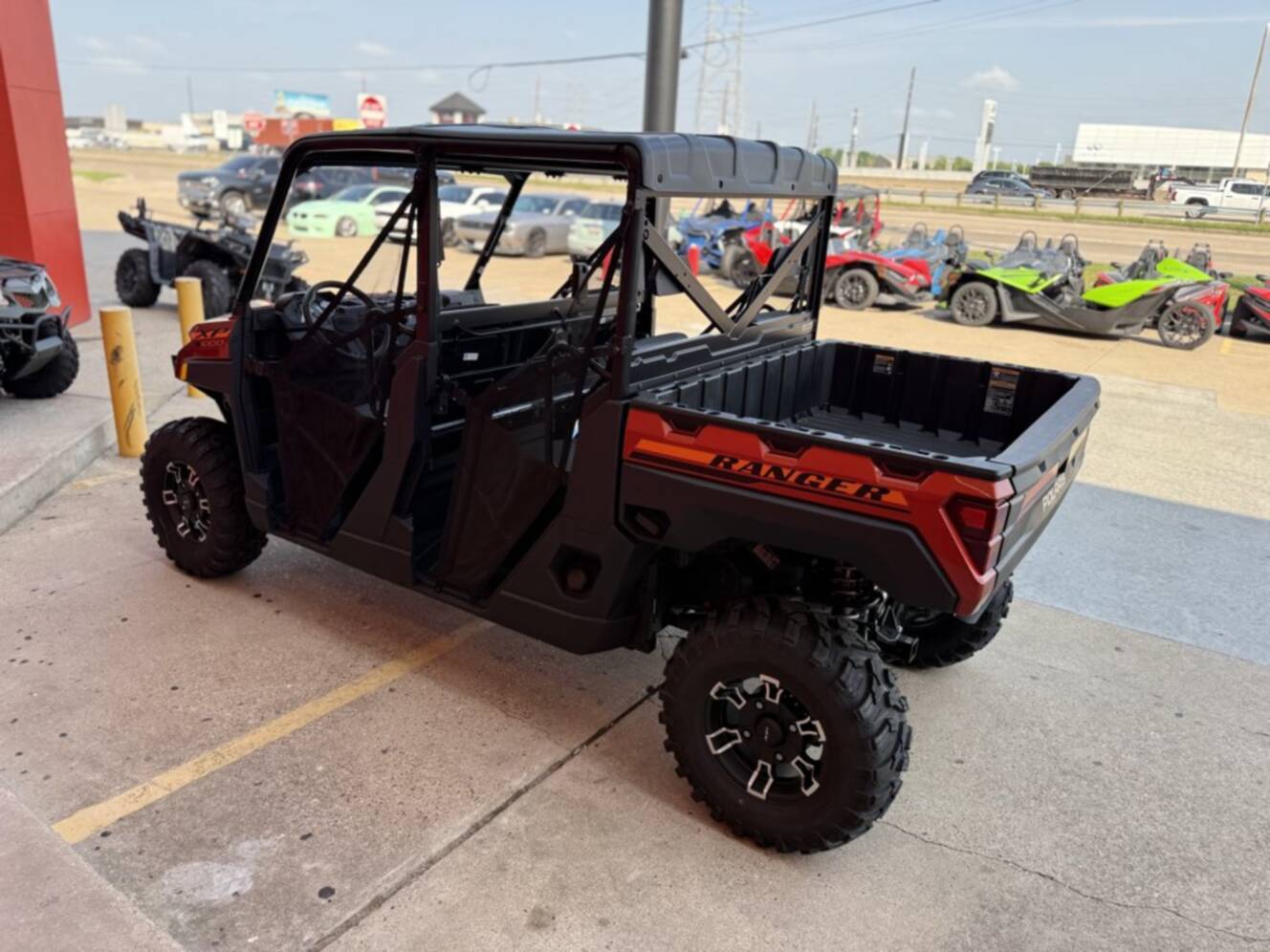 A photo of this 2026 Polaris RGR CREW XP 1000 PREMIUM ORANGE RUST Premium