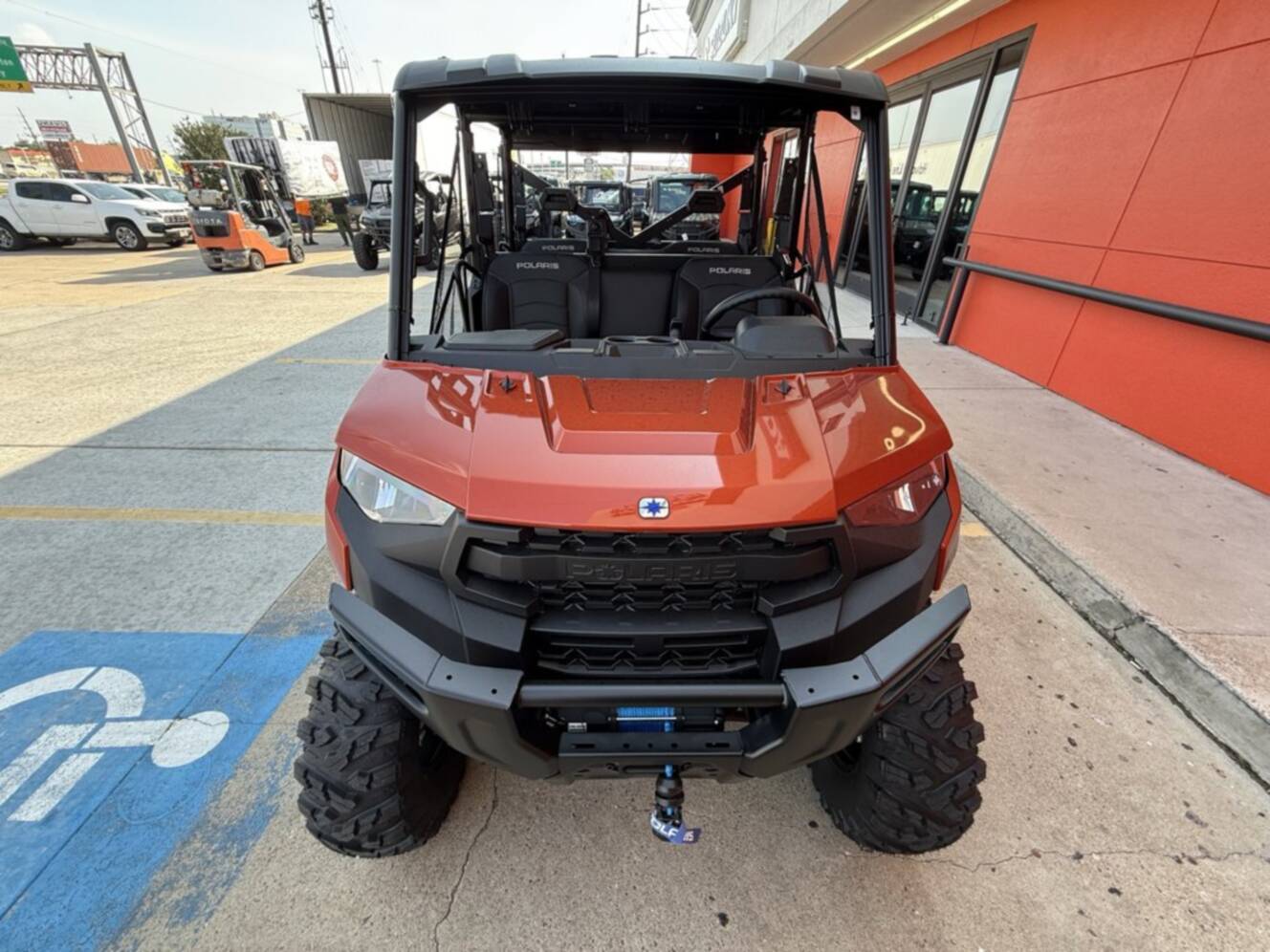 A photo of this 2026 Polaris RGR CREW XP 1000 PREMIUM ORANGE RUST Premium