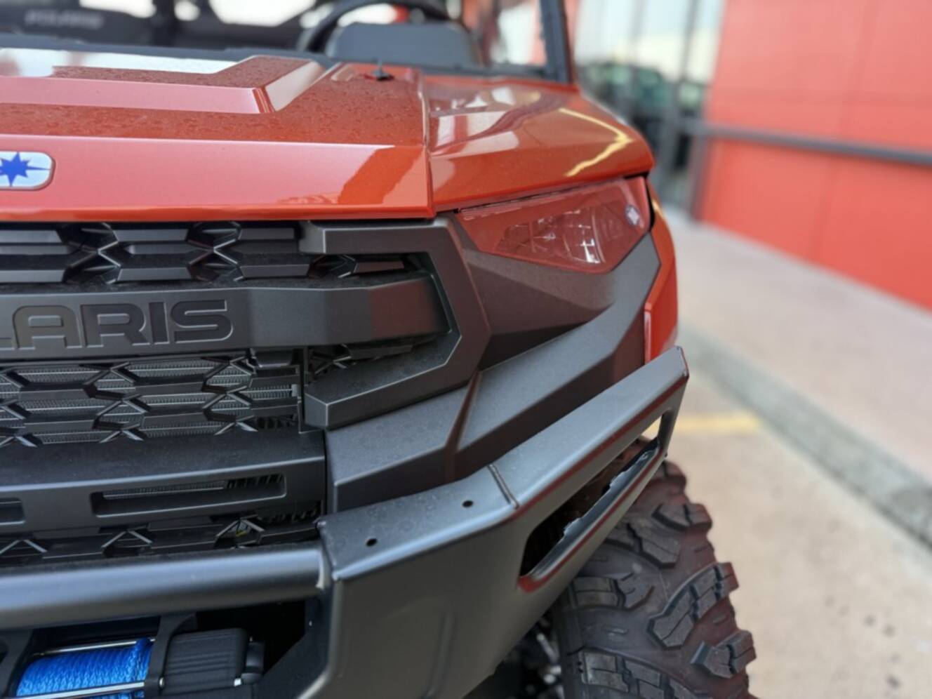 A photo of this 2026 Polaris RGR CREW XP 1000 PREMIUM ORANGE RUST Premium