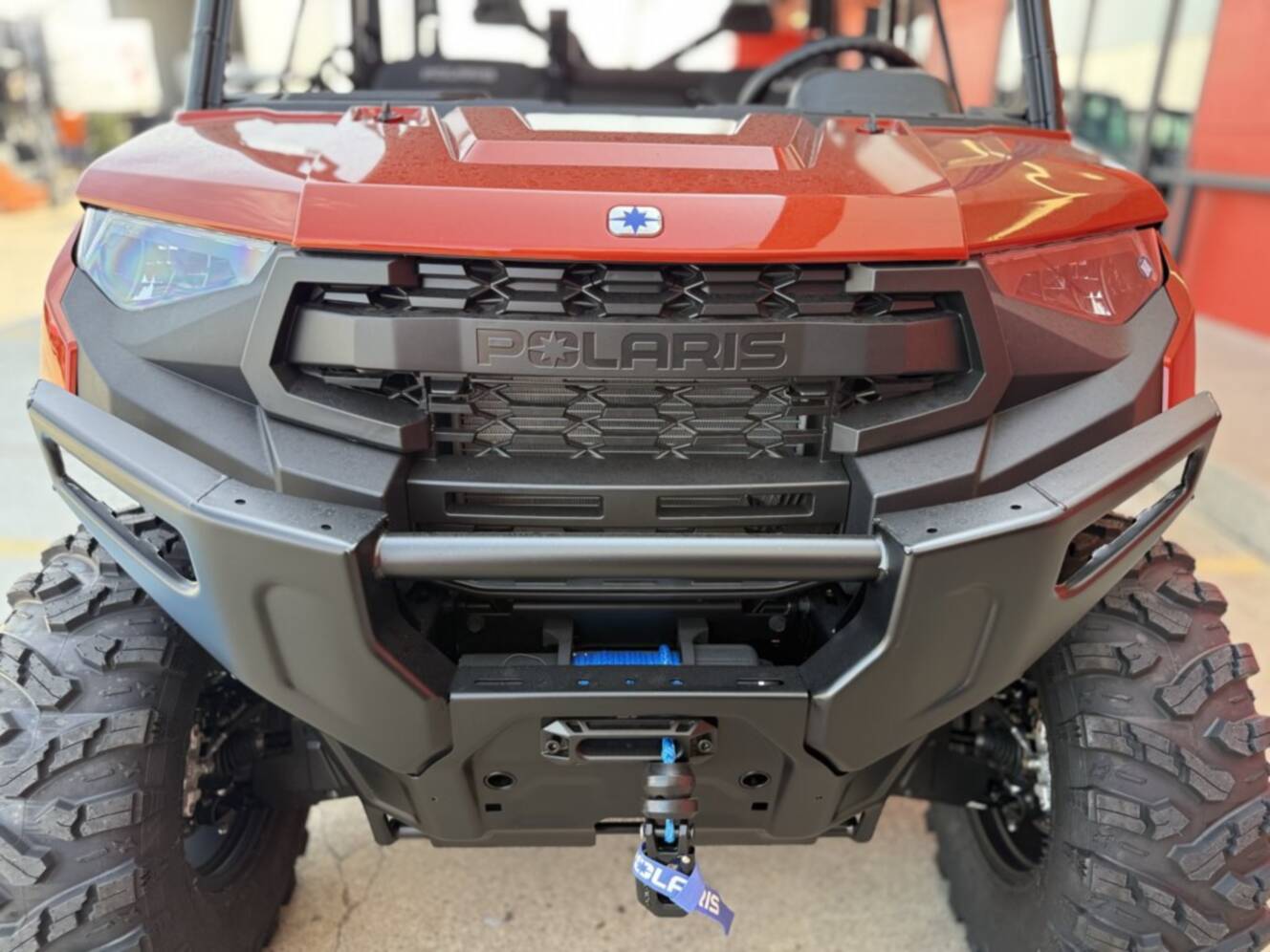 A photo of this 2026 Polaris RGR CREW XP 1000 PREMIUM ORANGE RUST Premium