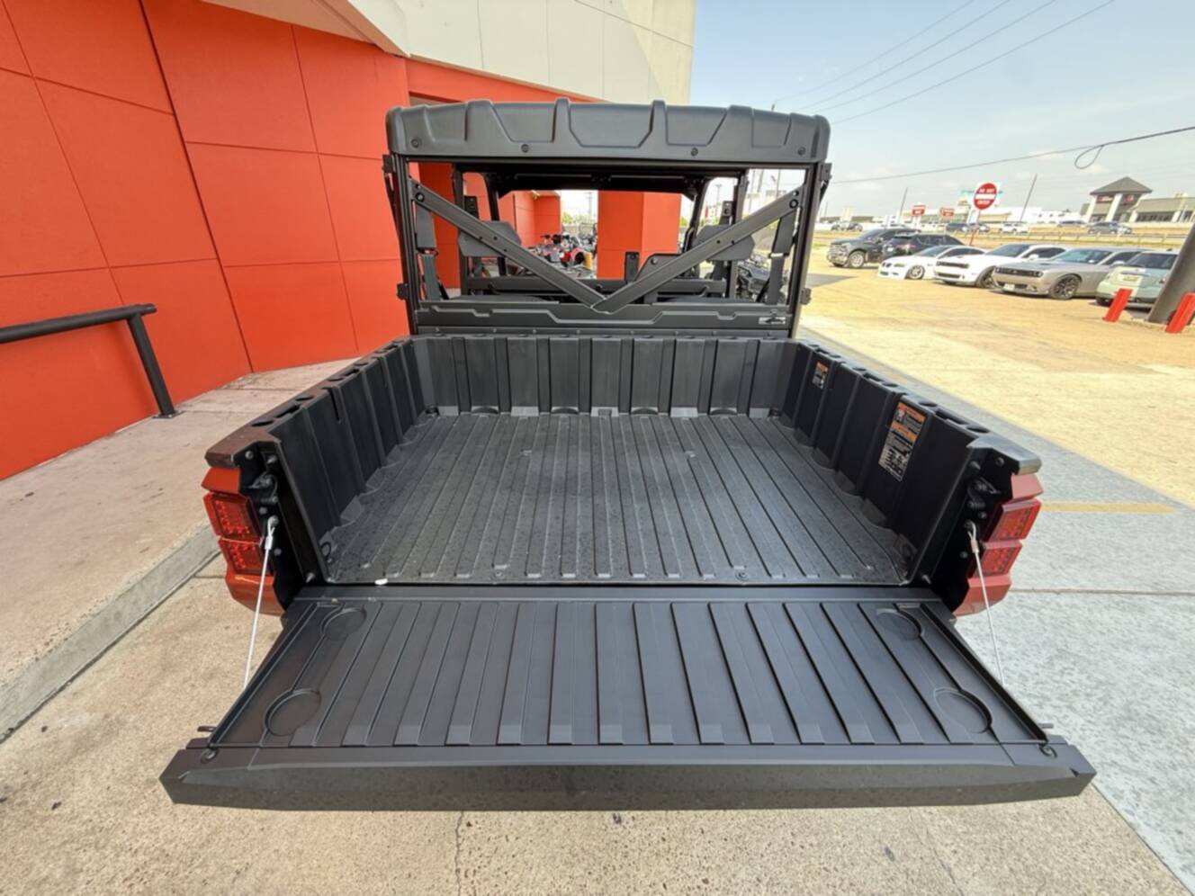 A photo of this 2026 Polaris RGR CREW XP 1000 PREMIUM ORANGE RUST Premium