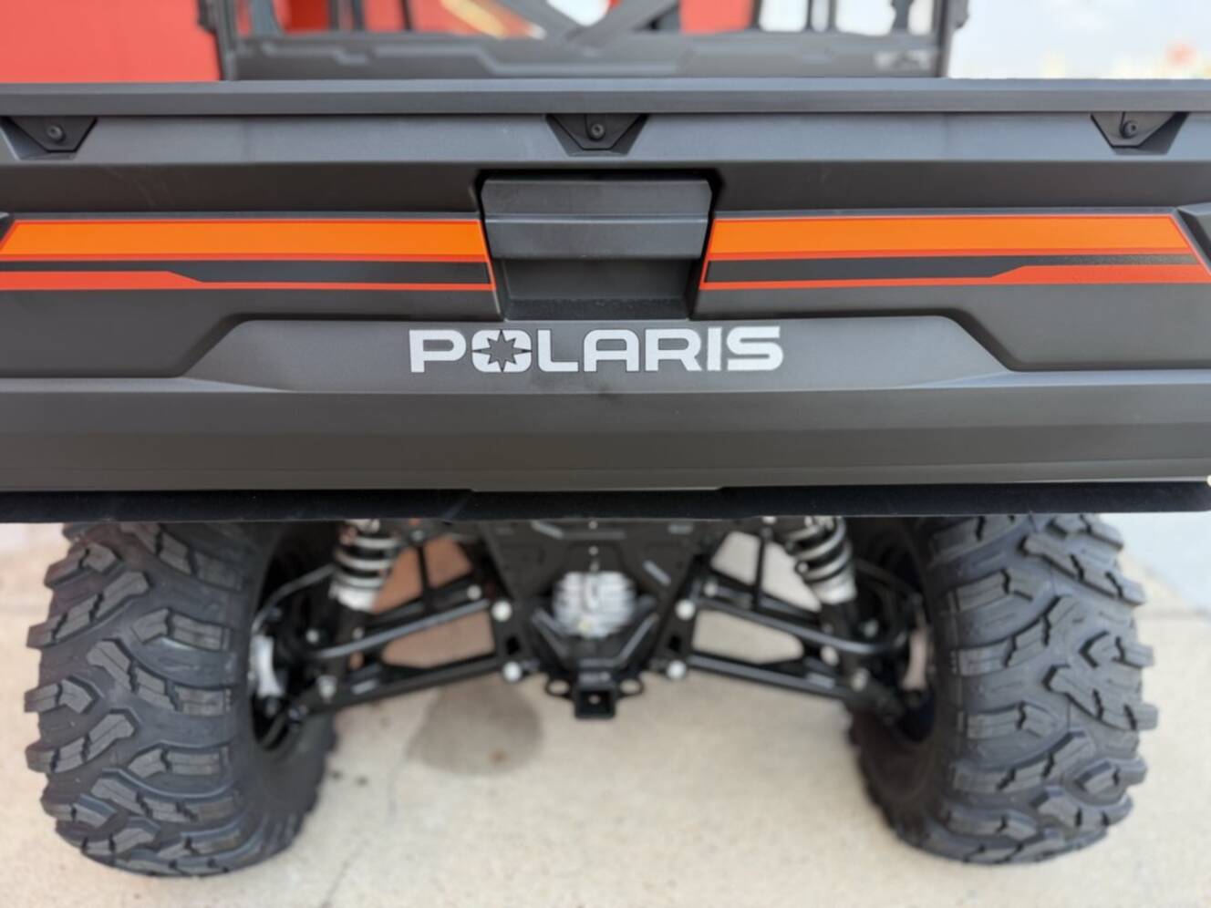 A photo of this 2026 Polaris RGR CREW XP 1000 PREMIUM ORANGE RUST Premium