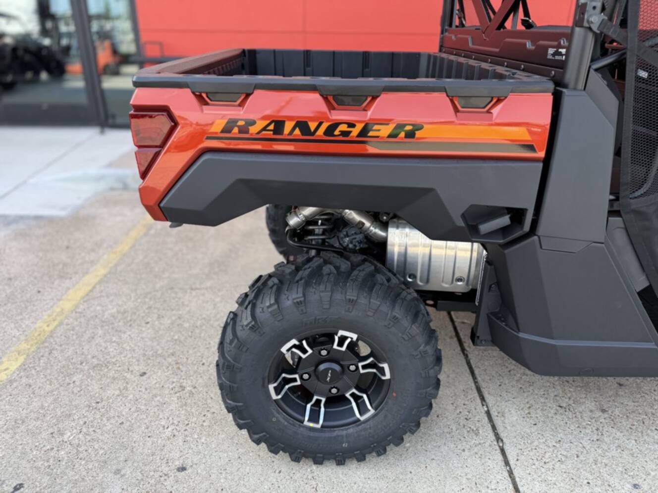 A photo of this 2026 Polaris RGR CREW XP 1000 PREMIUM ORANGE RUST Premium