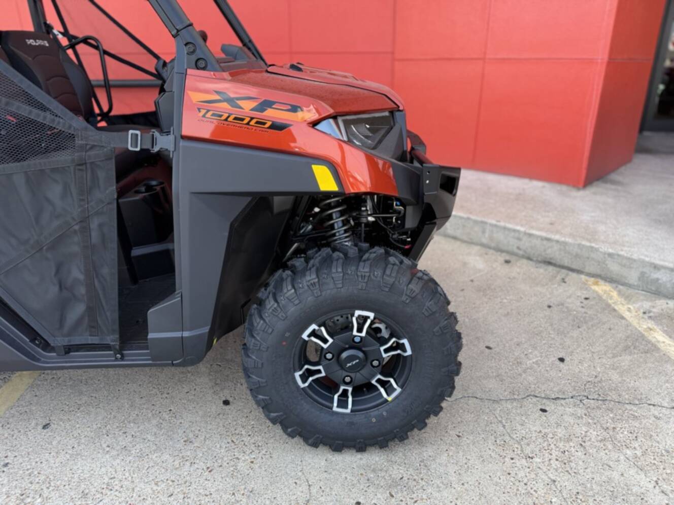 A photo of this 2026 Polaris RGR CREW XP 1000 PREMIUM ORANGE RUST Premium