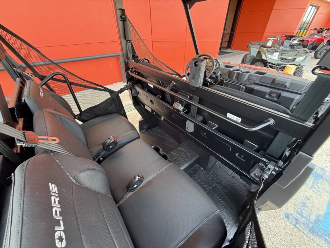 A photo of this 2026 Polaris RGR CREW XP 1000 PREMIUM ORANGE RUST Premium