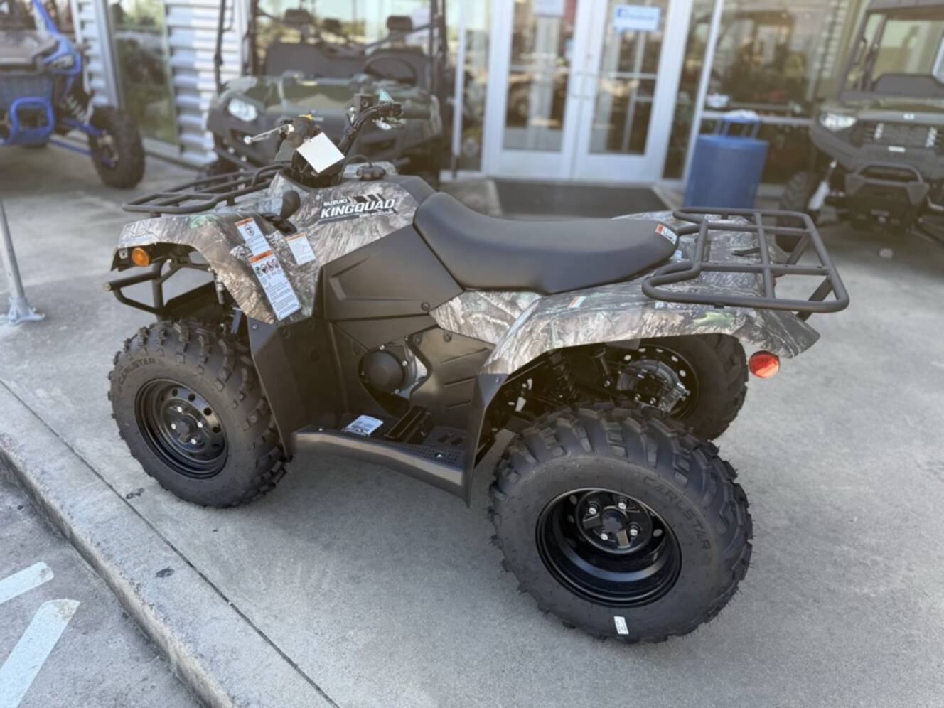 A photo of this 2026 Suzuki KINGQUAD 400ASi CAMO