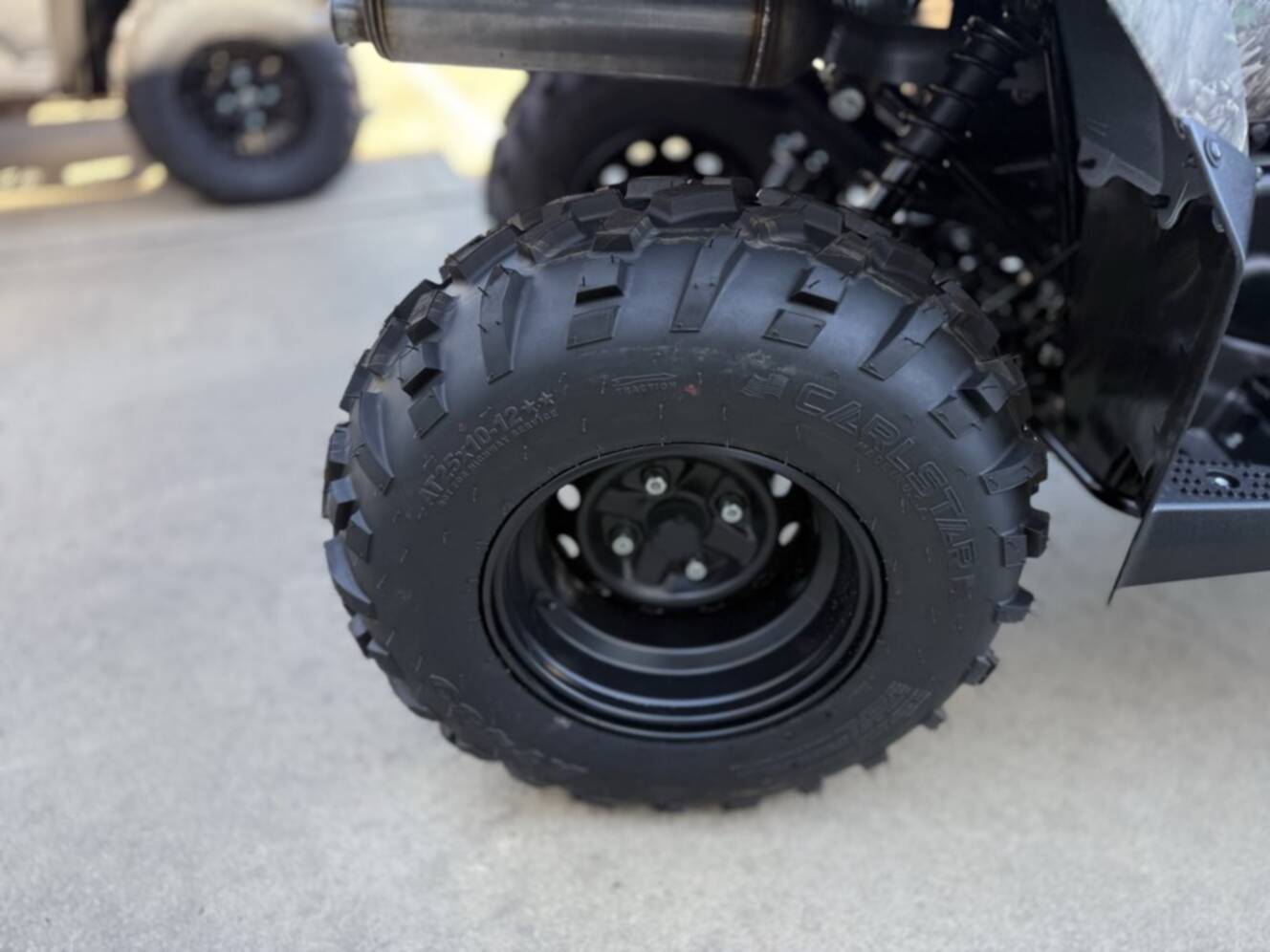 A photo of this 2026 Suzuki KINGQUAD 400ASi CAMO