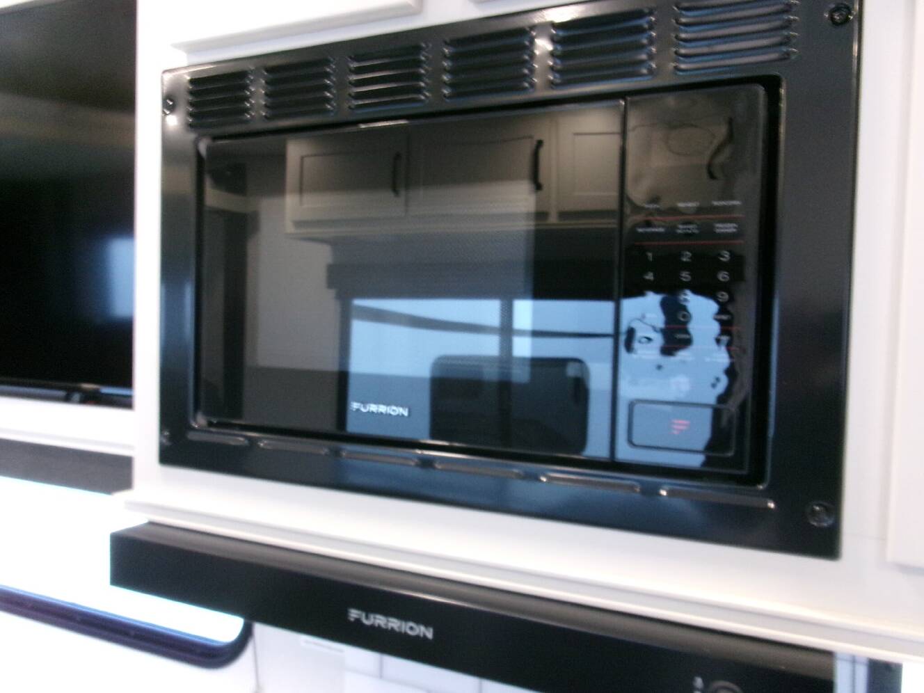 A photo of this 2026 Grand Design Momentum G-Class 27G