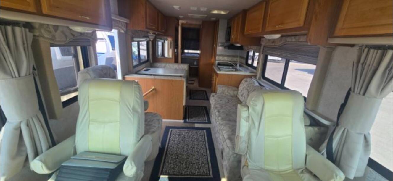 A photo of this 2002 Fleetwood Storm 30H