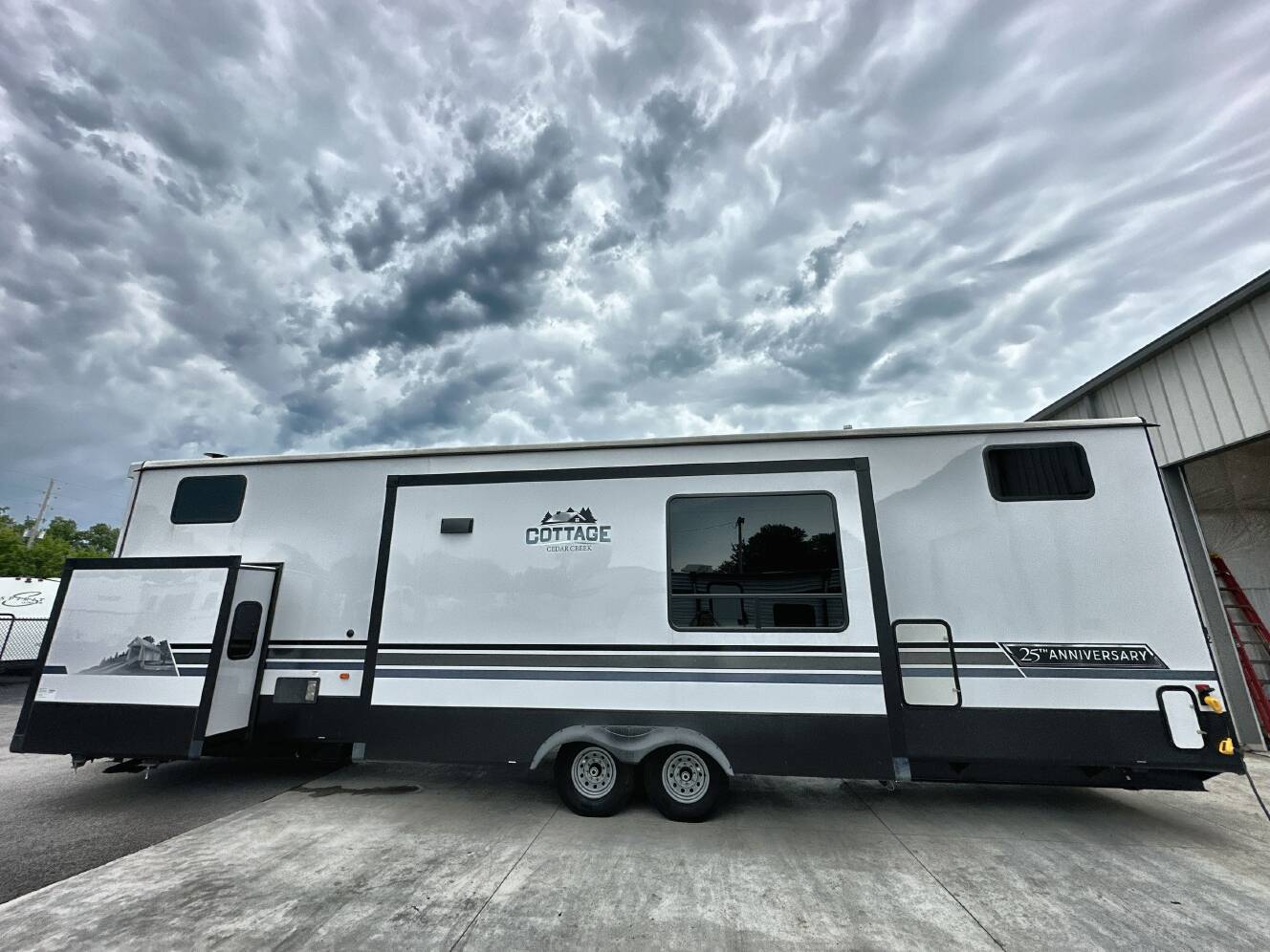A photo of this 2024 Forest River CEDAR CREEK COTTAGE 40CBK
