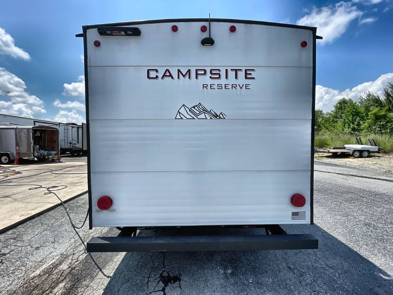 A photo of this 2024 Forest River CAMPSITE RESERVE 26CJ
