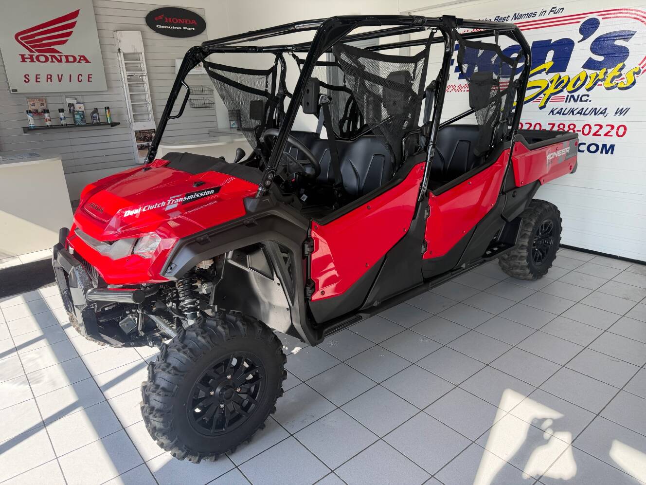 A photo of this 2024 Honda Pioneer 1000-6 Deluxe Crew