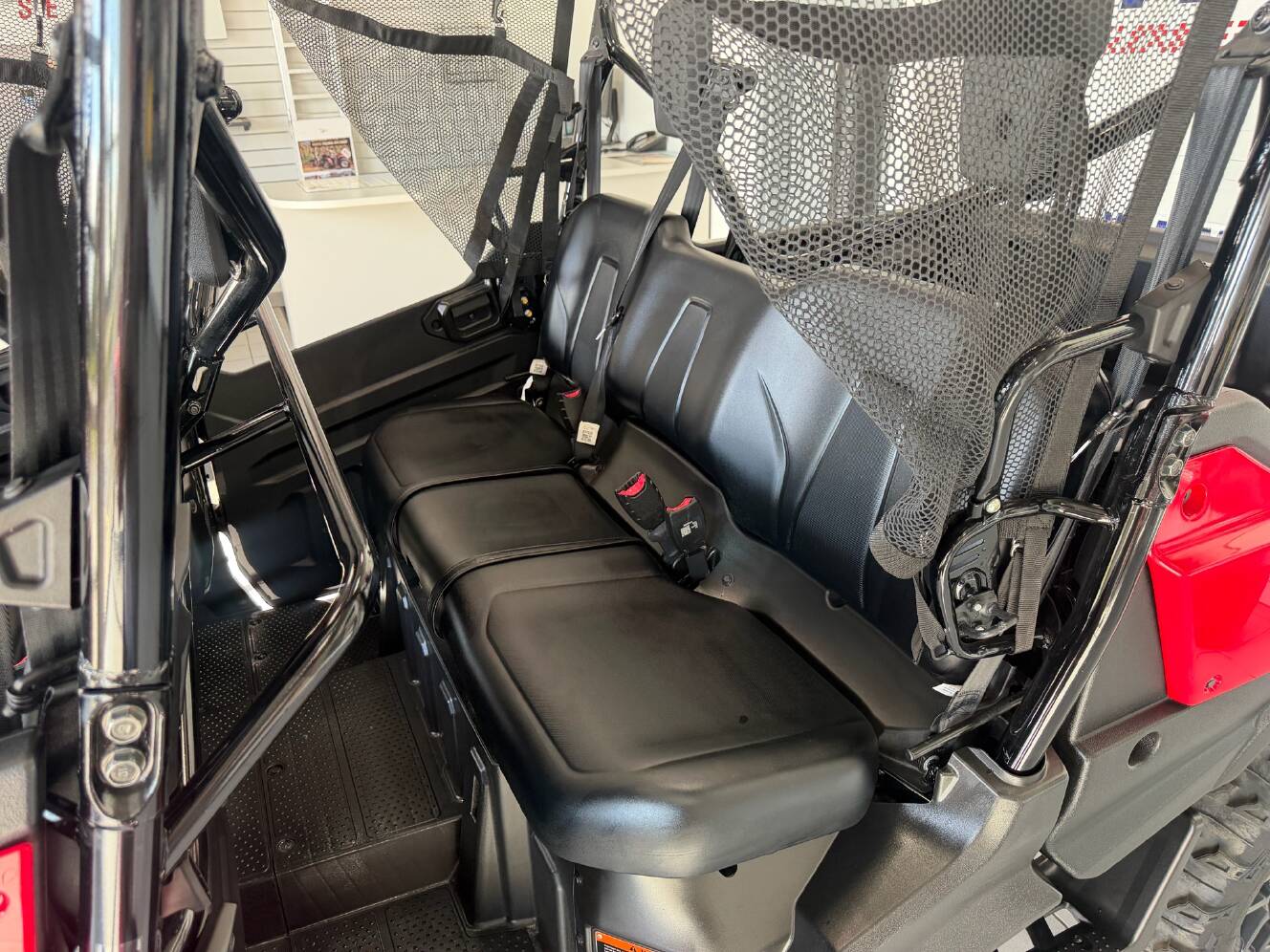 A photo of this 2024 Honda Pioneer 1000-6 Deluxe Crew