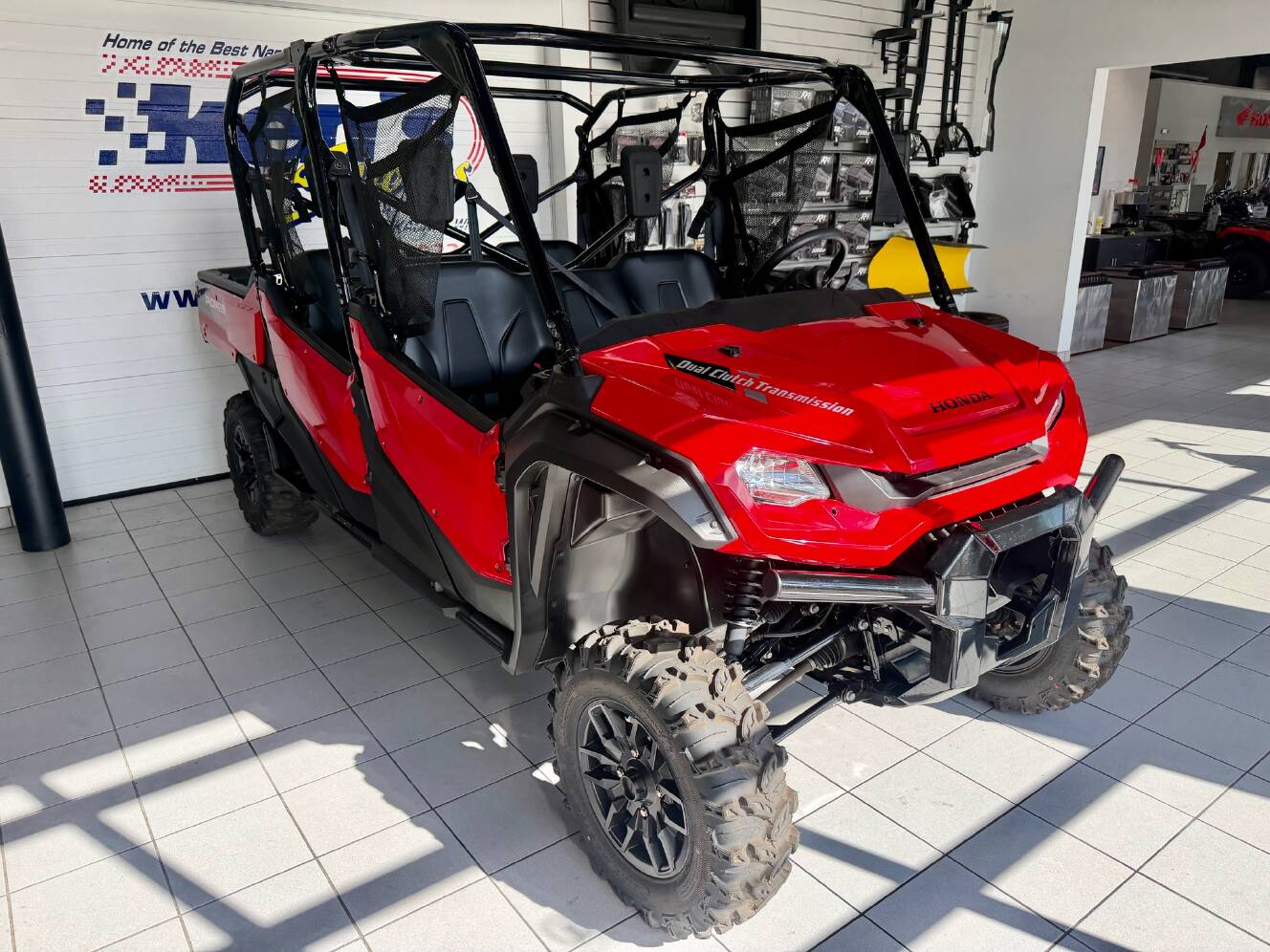 A photo of this 2024 Honda Pioneer 1000-6 Deluxe Crew