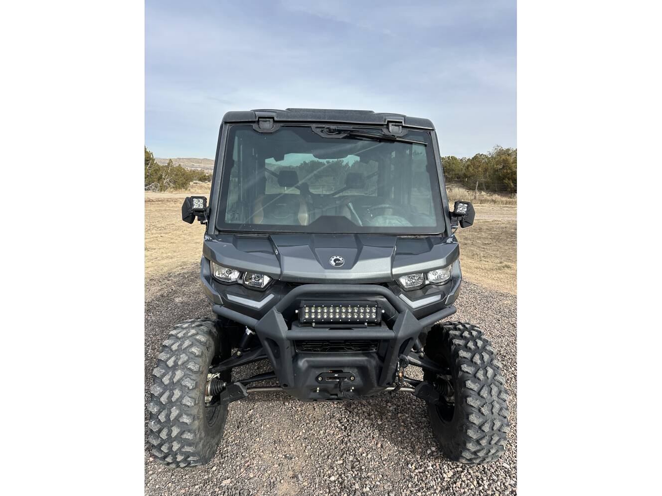 A photo of this 2023 Can-Am DEFENDER MAX DPS CAB HD10