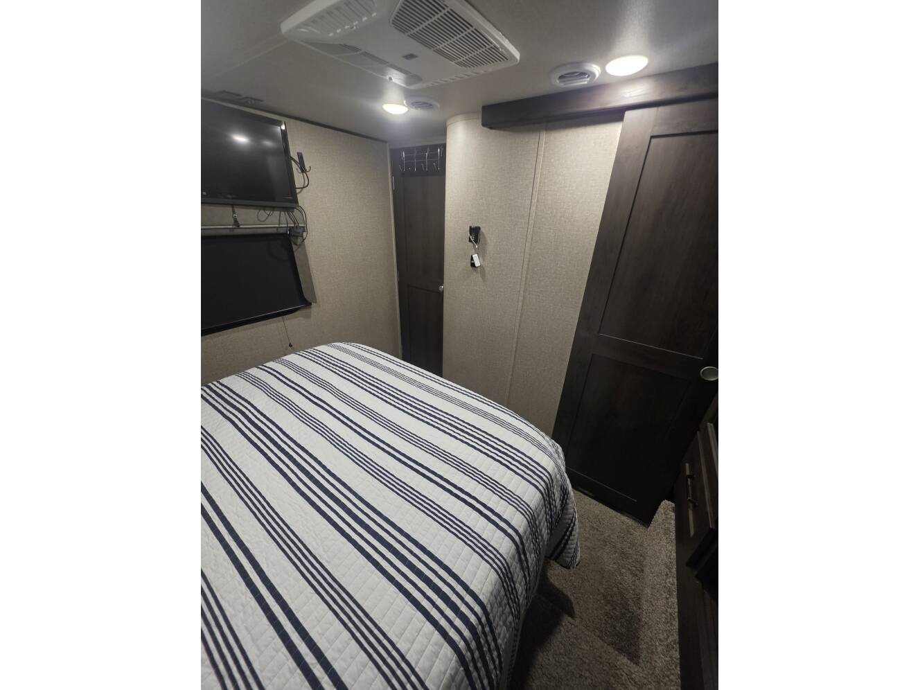 A photo of this 2022 Grand Design REFLECTION 303RLS