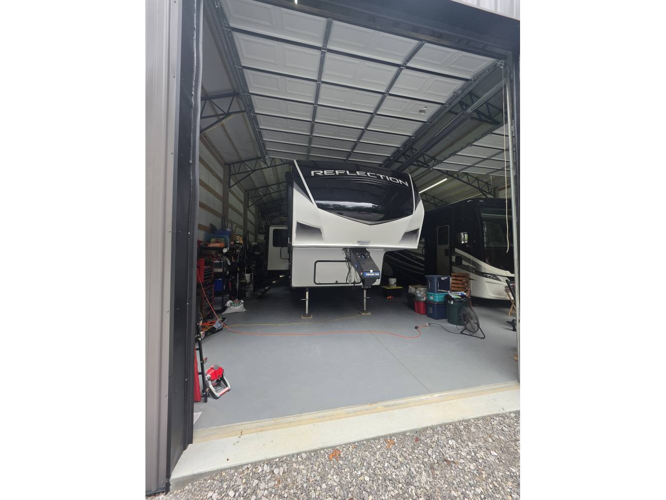 A photo of this 2022 Grand Design REFLECTION 303RLS