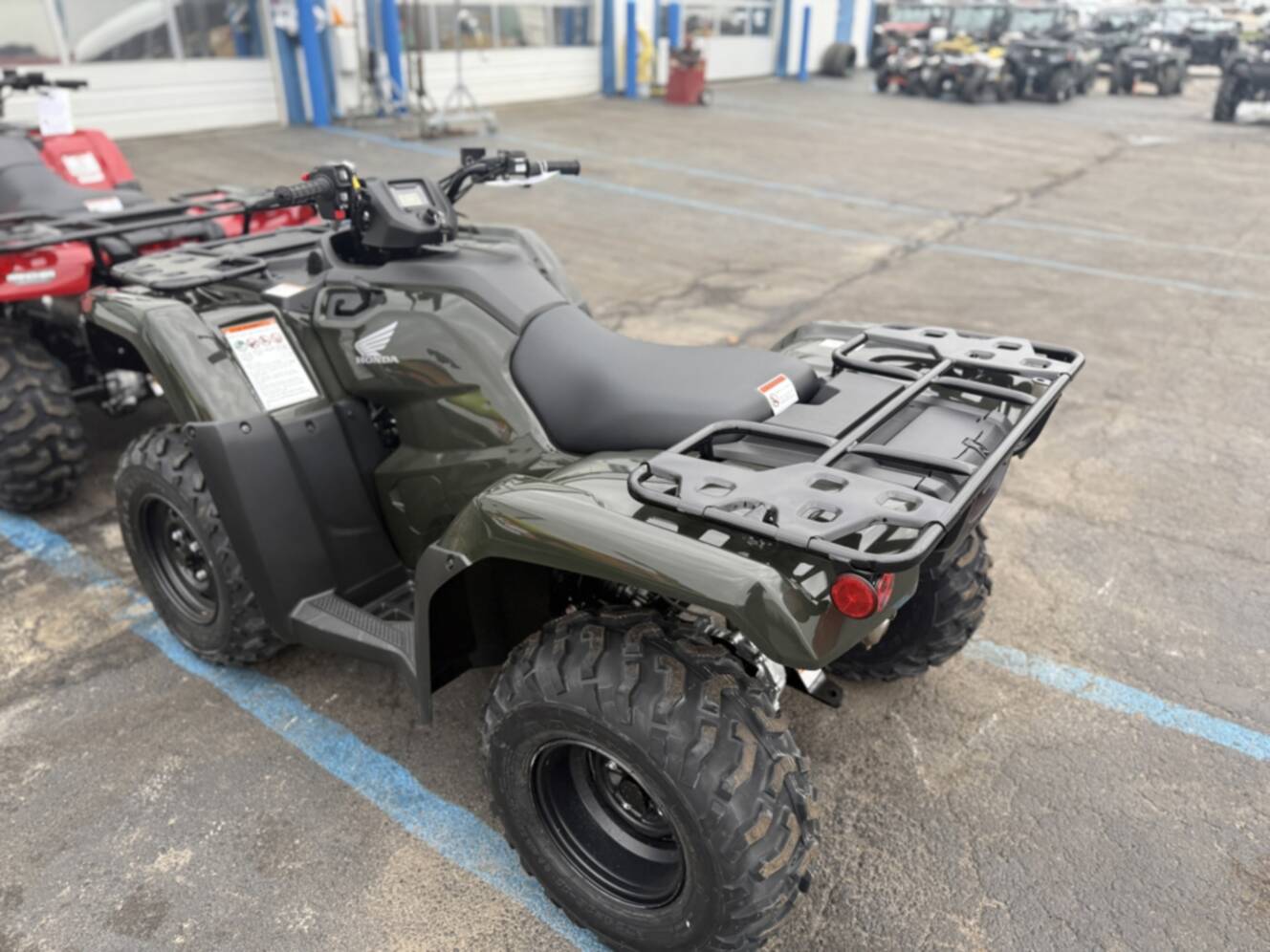 A photo of this 2025 Honda FourTrax Rancher 4X4 Automatic DCT EPS
