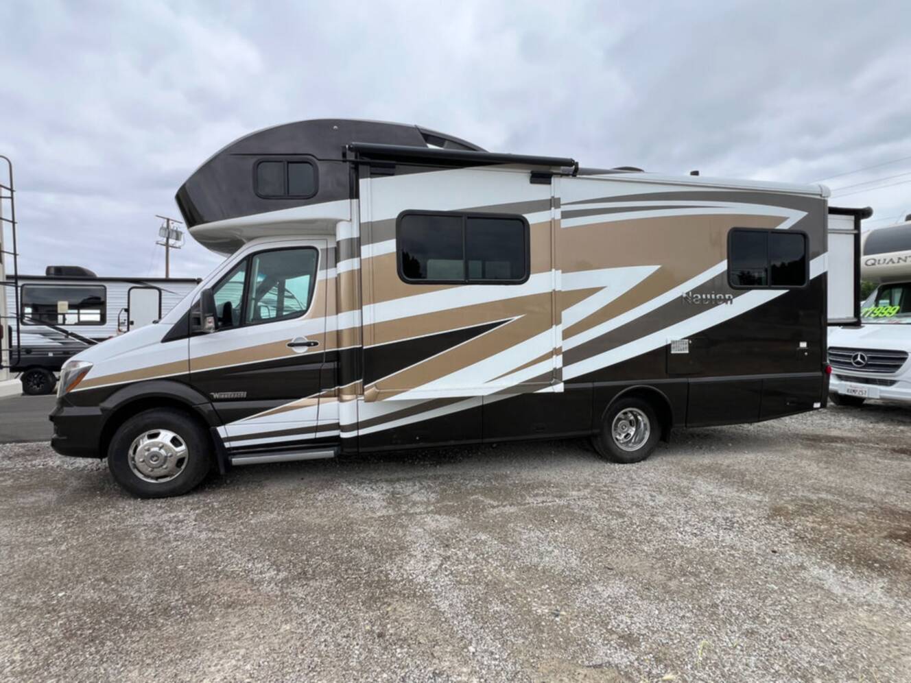 A photo of this 2015 Winnebago Navion 24G