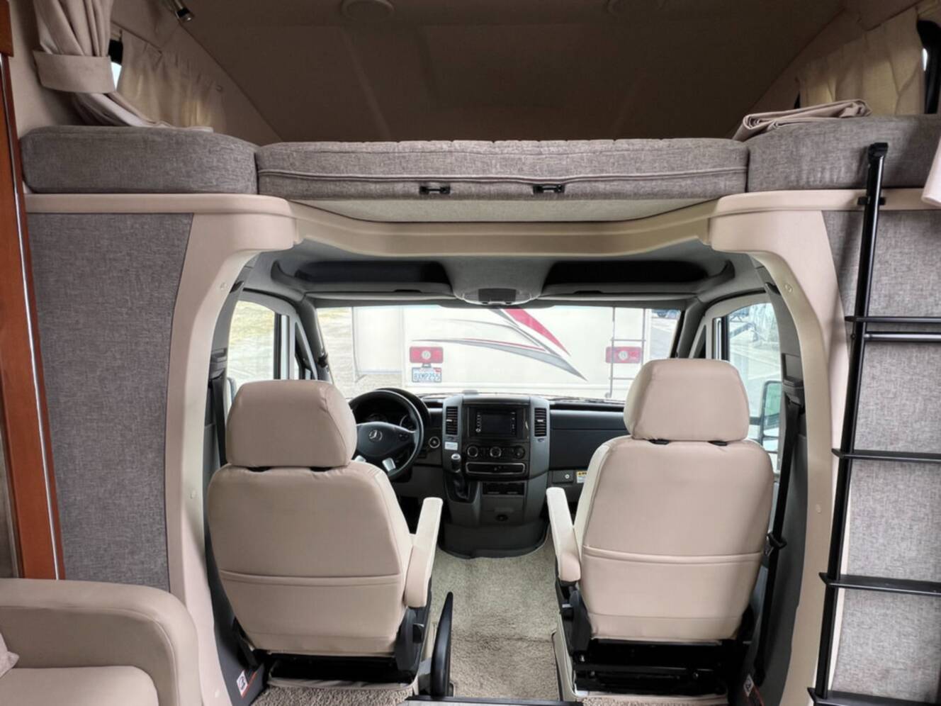 A photo of this 2015 Winnebago Navion 24G