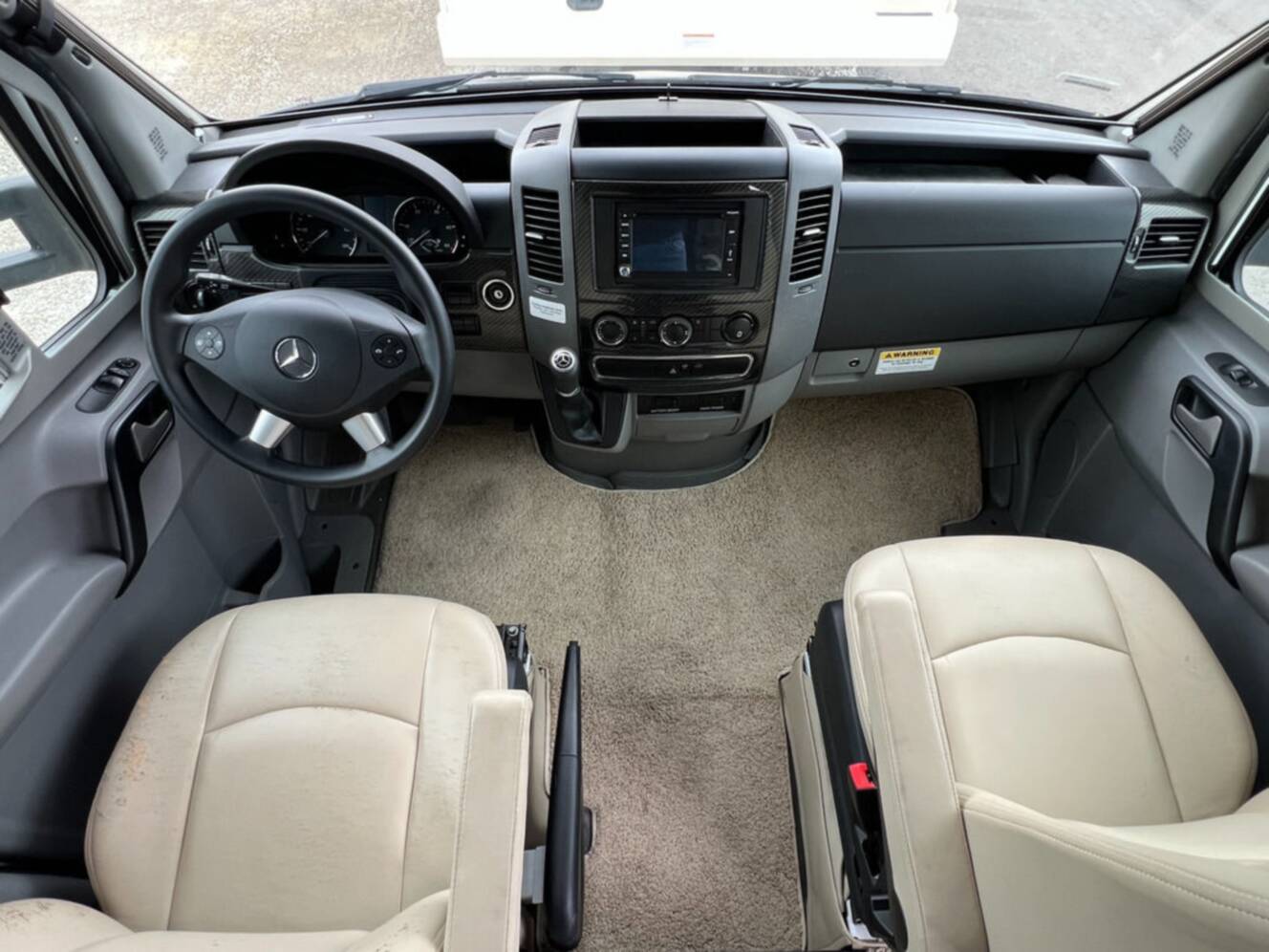 A photo of this 2015 Winnebago Navion 24G
