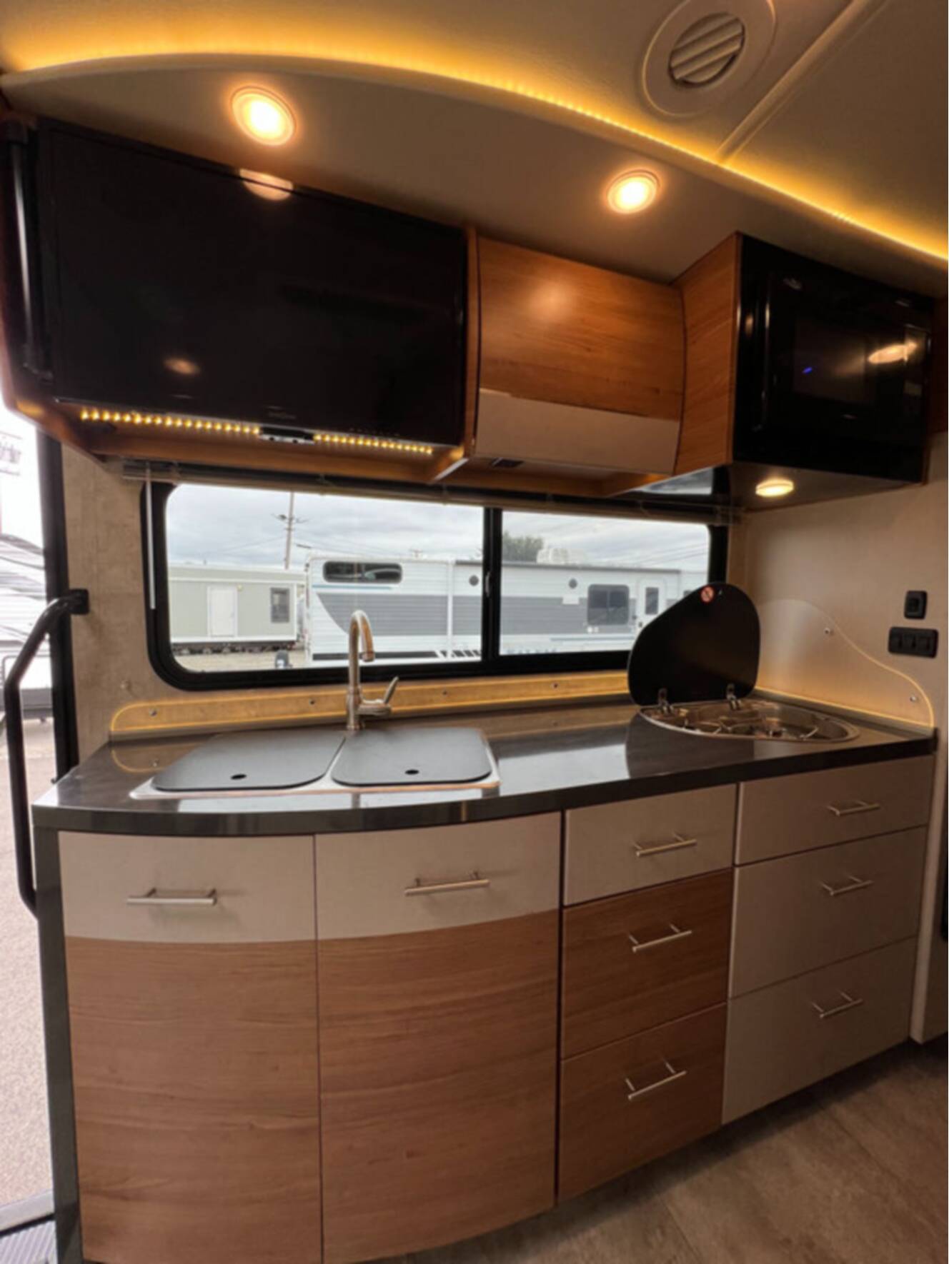 A photo of this 2015 Winnebago Navion 24G